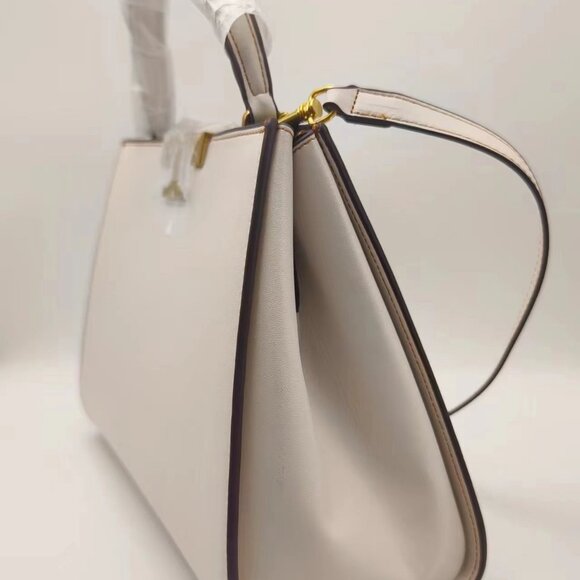 Brand new Tory Burch apricot handbag. - Picture 3 of 11